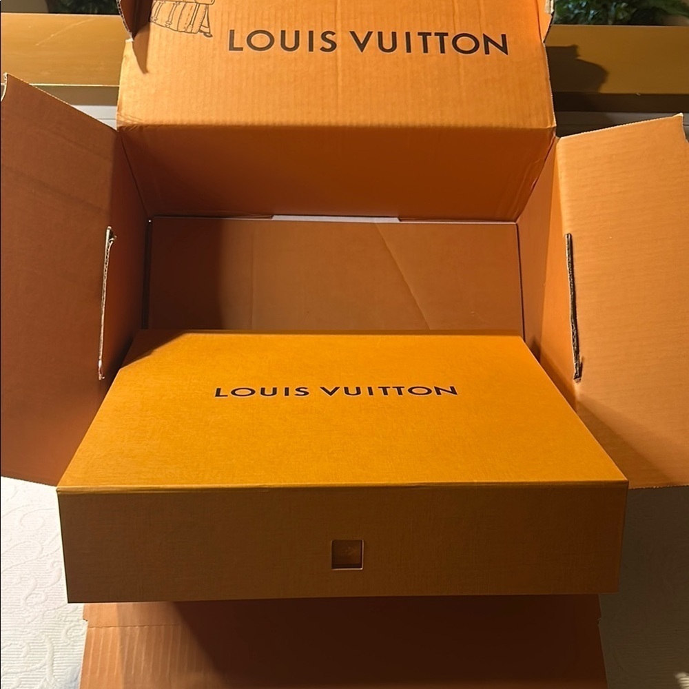 Louis Vuitton Signature  Box inside a LV shipping box with tissue and ribbon.
